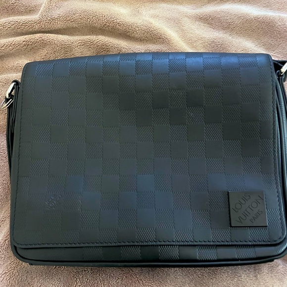 This is my black Louis Vuitton messenger bag, wore it one time perfectly good. - Picture 1 of 9